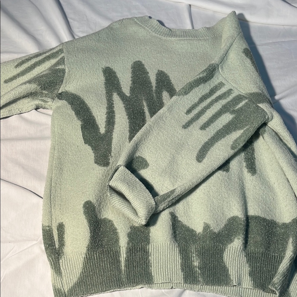 Princess Polly Green Crew Neck Sweater with Artistic Design